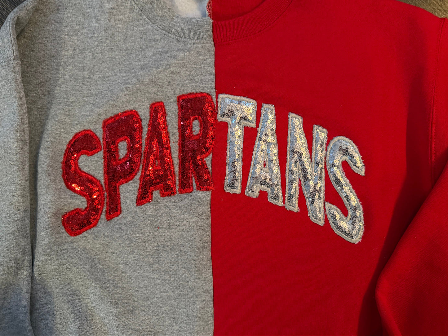 Two-tone Spartans crewneck with sequins and embroidery