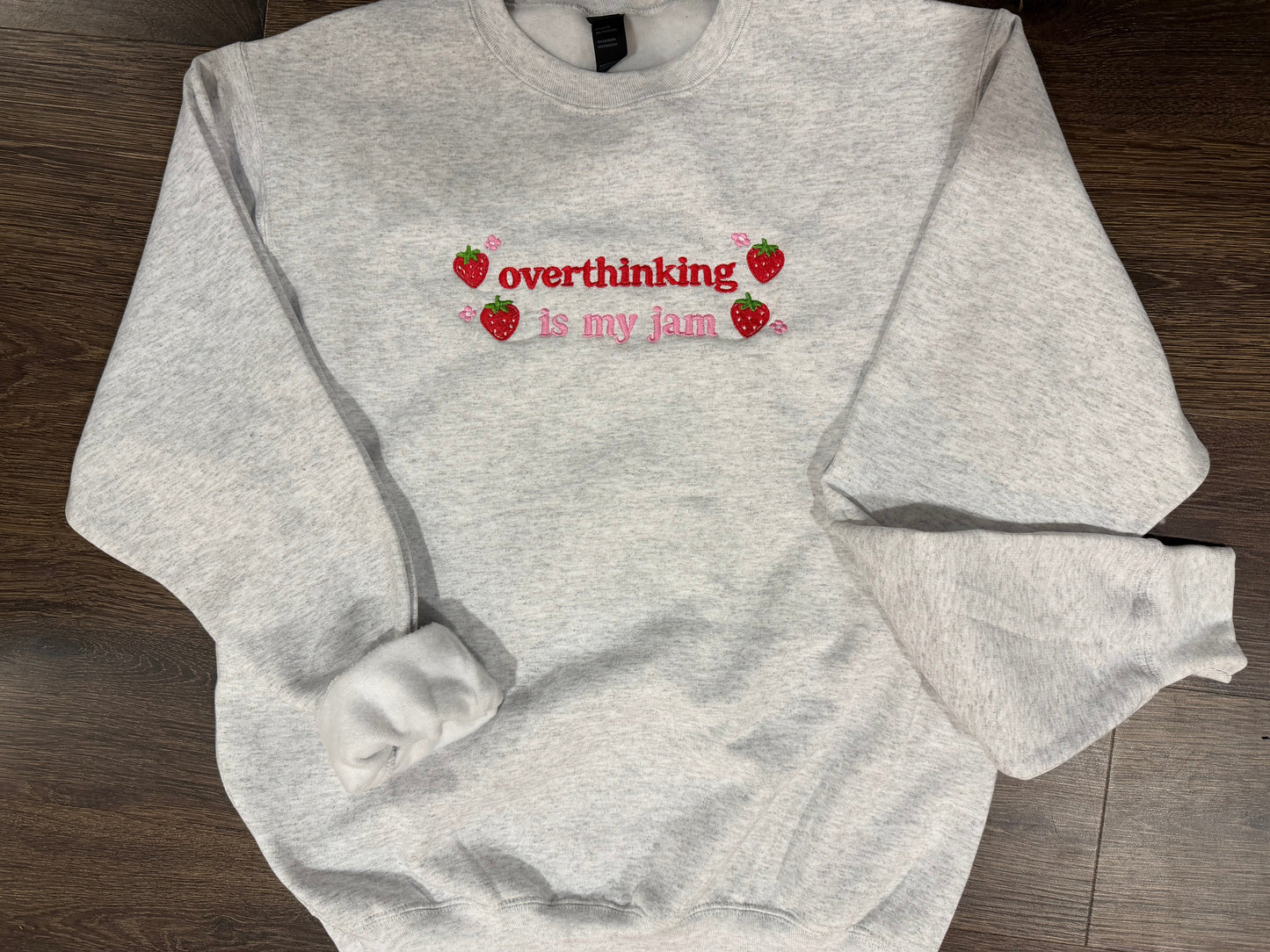 "Overthinking is my jam" with strawberries- embroidered crewneck