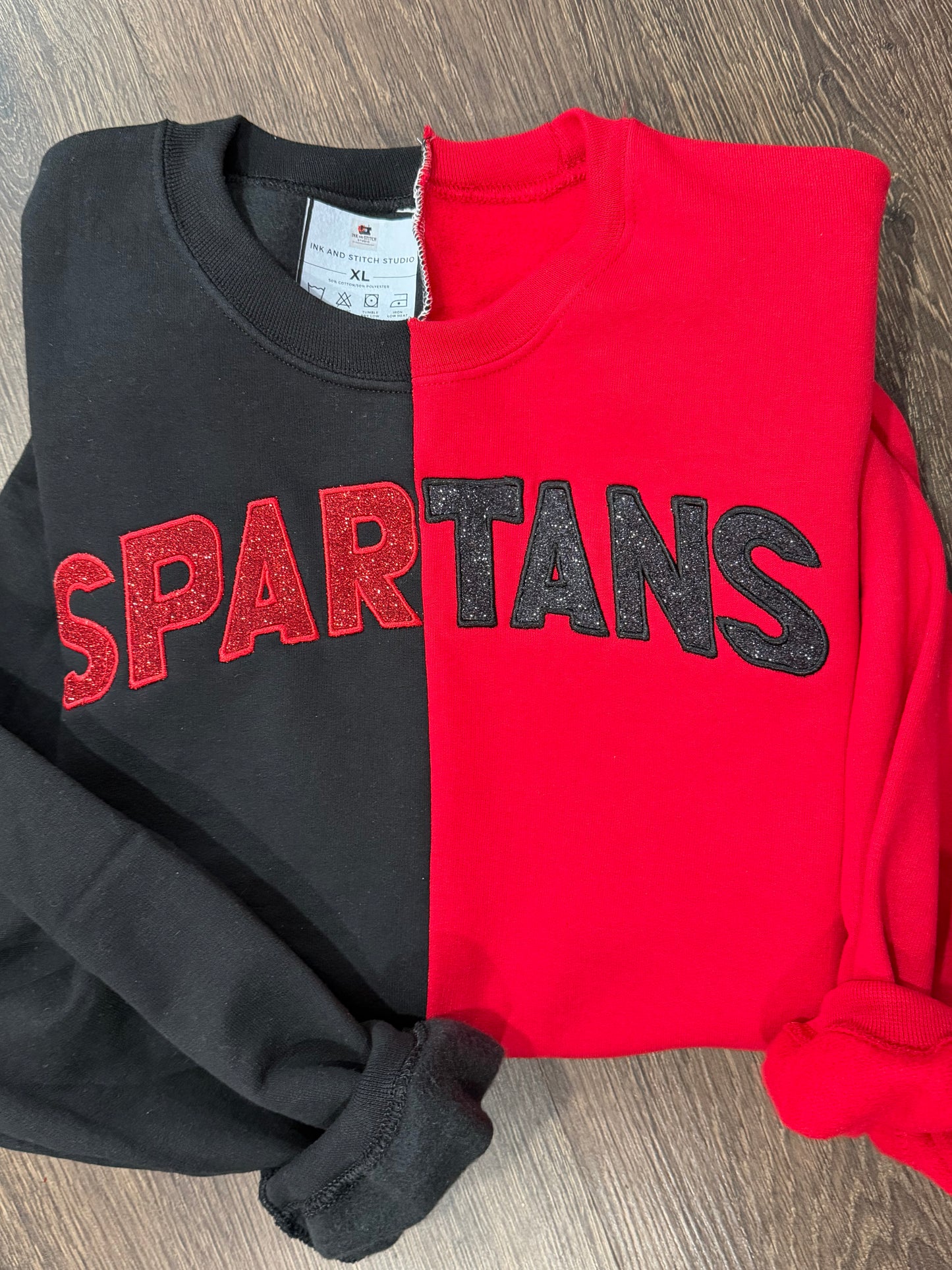 Spartans black/red split crewneck with glitter embroidery