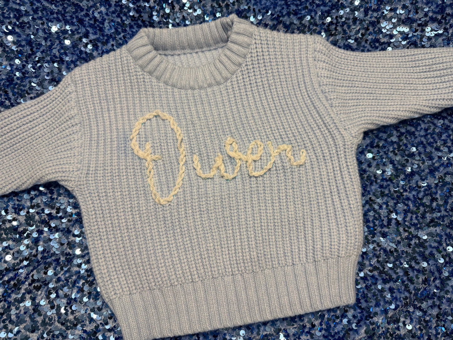 Hand embroidered baby sweater