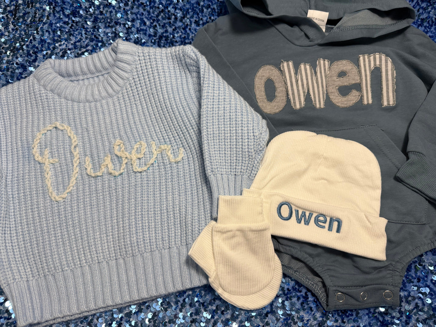 Hand embroidered baby sweater